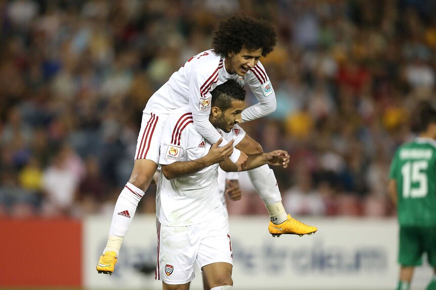 Omar Abdulrahman and Ali Ahmed Mabkhout celebrate a UAE goal