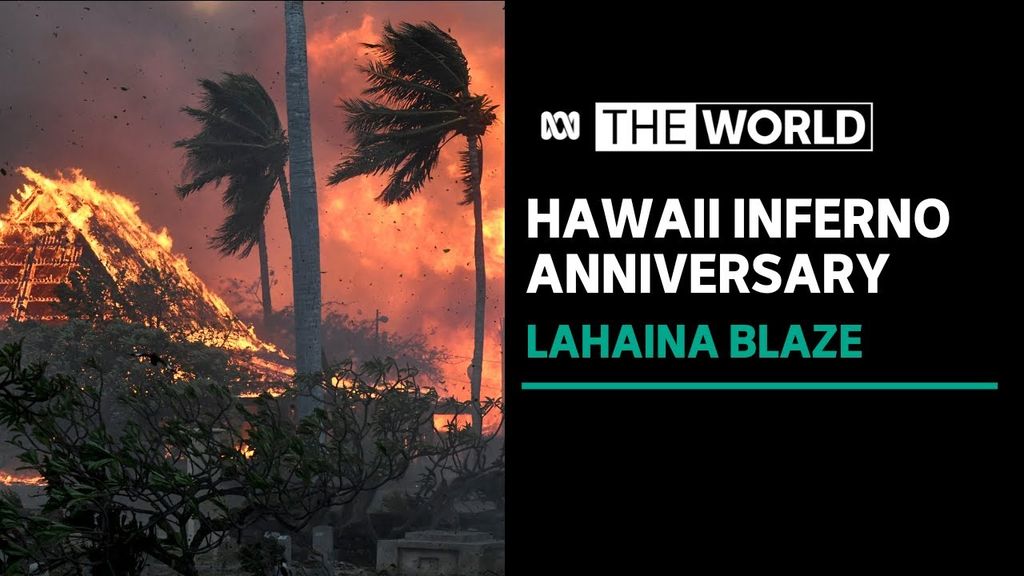 Hawaii Inferno Anniversary, Lahaina Blaze: A conflagration burns a roof. Two palm trees are blown by strong wind.
