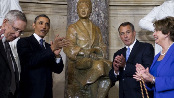 President Barack Obama, Speaker John Boehner, R-Ohio, and House Minority Leader Nancy Pelosi, D-Calif., unveil a statue of civil rights activist Rosa Parks during a ceremony in the Capitol's Statuary Hall, feb 27 2013