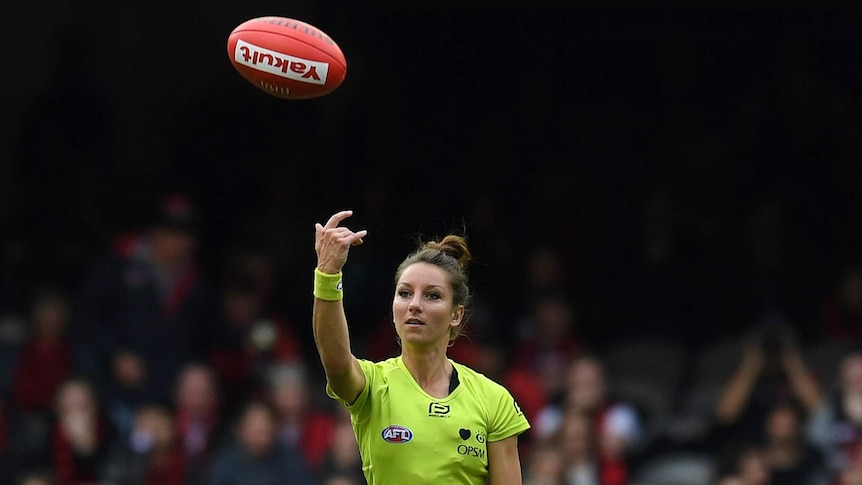 Eleni Glouftsis throws the ball up during Bombers vs Eagles match