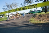 Crime scene tape limits access to Umpqua Community College