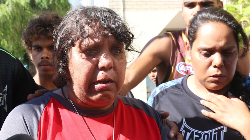 Cynthia Brockman, red shirt, mother of Patrick Steven Slater, who was murdered after a fight at the Perth Esplanade Train Station in January 2016