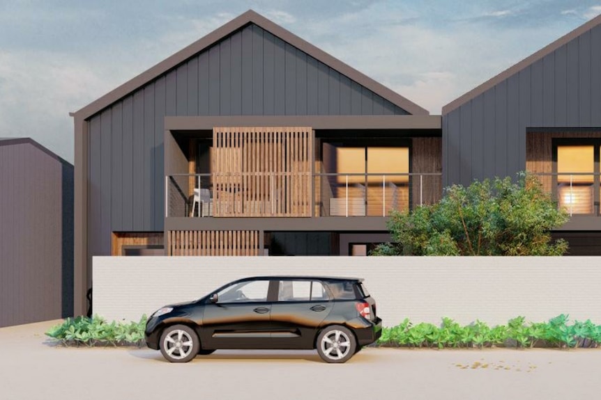 A modern, black and wood home with two cars out the front.