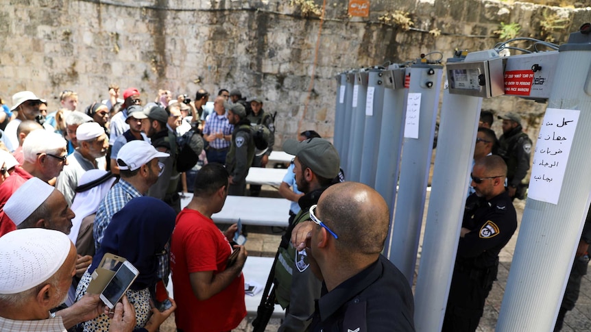 Palestinians try to enter the Noble Sanctuary / Temple Mount where metal detectors have been installed.