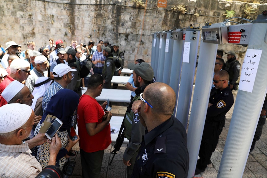 Palestinians try to enter the Noble Sanctuary / Temple Mount where metal detectors have been installed.