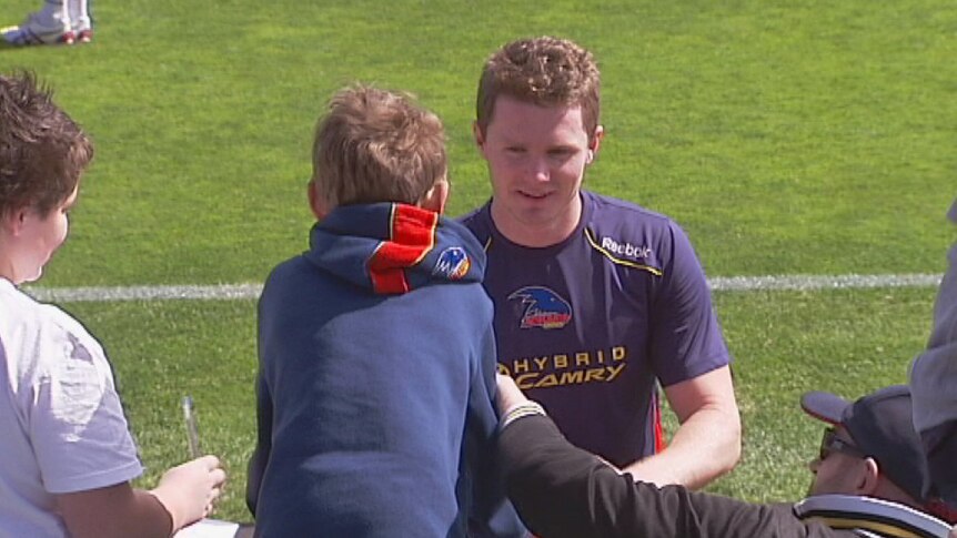 Patrick Dangerfield signs autographs at Crows training, September 7 2012