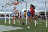 Morgan Gaffney (white shirt) pips Morgan Mitchell (red) for the Women's Gift in Burnie.