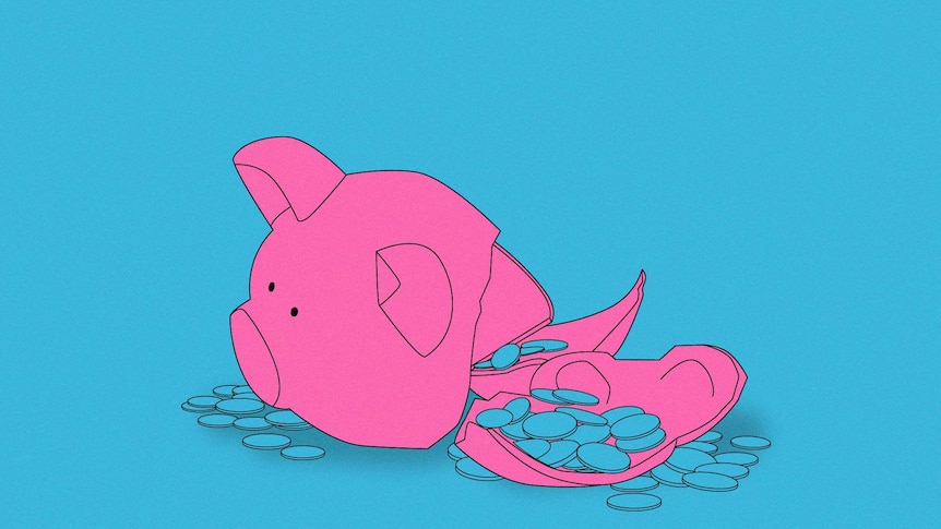 Illustration of pink piggy bank on blue background, broken in half with coins spilled everywhere.
