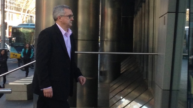 Barry Wells arrives at court, he is accused of organising contracts worth $25 million for the PTV.