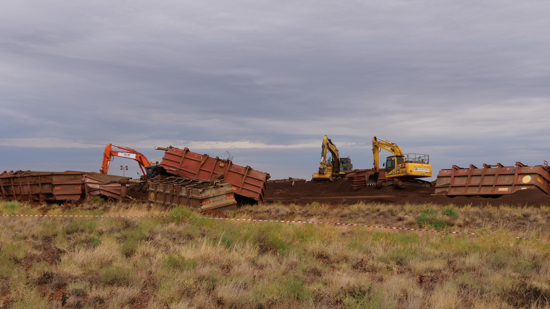 Rio Tinto rail line reopens in the Pilbara but cleanup continues after