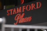 A red and black electric sign saying STAMFORD Plaza