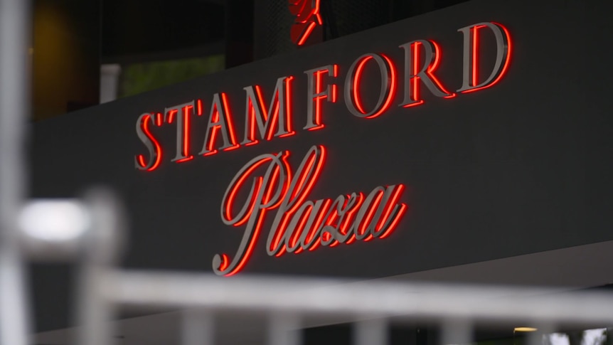 A red and black electric sign saying STAMFORD Plaza