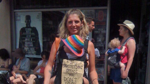 A protesting mother outside a cafe in Newtown, Sydney.