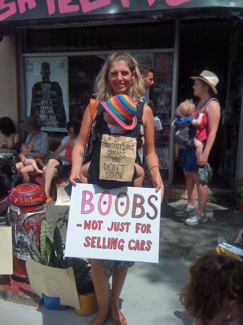 A protesting mother outside a cafe in Newtown, Sydney.