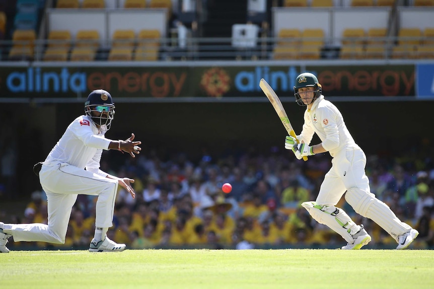 Australia's Marnus Labuschagne plays a shot past Sri Lanka's Lahiru Thirimanne.