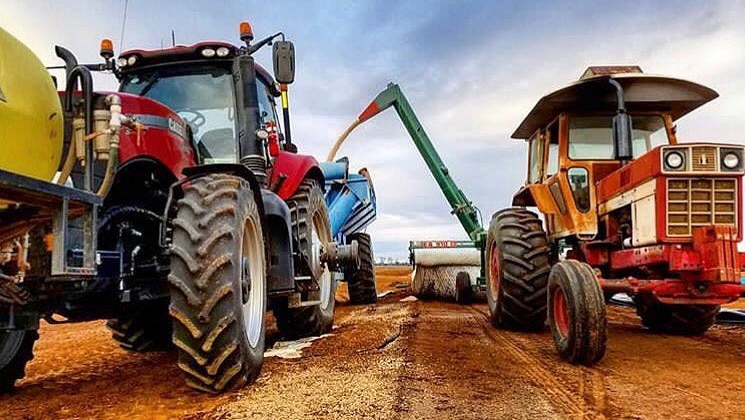 Two tractors side by side