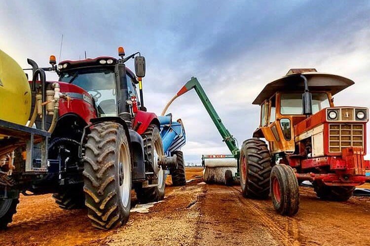 Two tractors side by side
