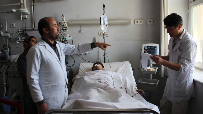 An injured soldier recovers in a hospital after Friday's attack at a military compound in Mazar-e-Sharif, Afghanistan.