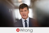 Angus Taylor speaking at a press conference. The verdict is "wrong" with a red cross