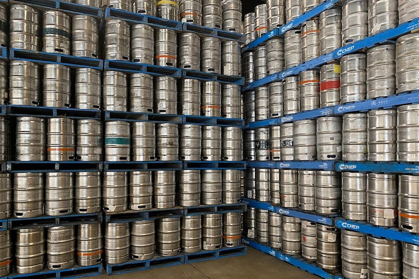 Beer kegs on shelving at XXXX brewery in Brisbane.