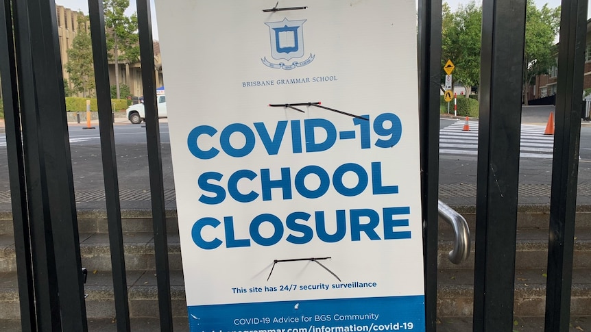 Sign reads Brisbane Grammar COVID-19 School Closure.