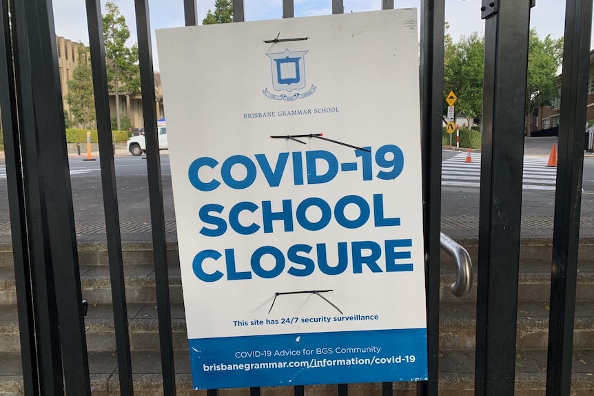 Sign reads Brisbane Grammar COVID-19 School Closure.