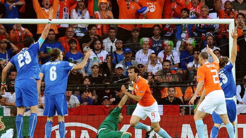 Dutch forward Ruud van Nistelrooy nets the contraversial goal.