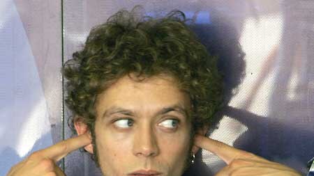 Valentino Rossi obviously does not like what he hears.