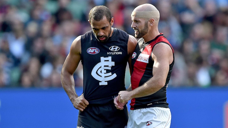 Fiery clash ... Chris Yarran (L) and Paul Chapman during Saturday's match at the MCG