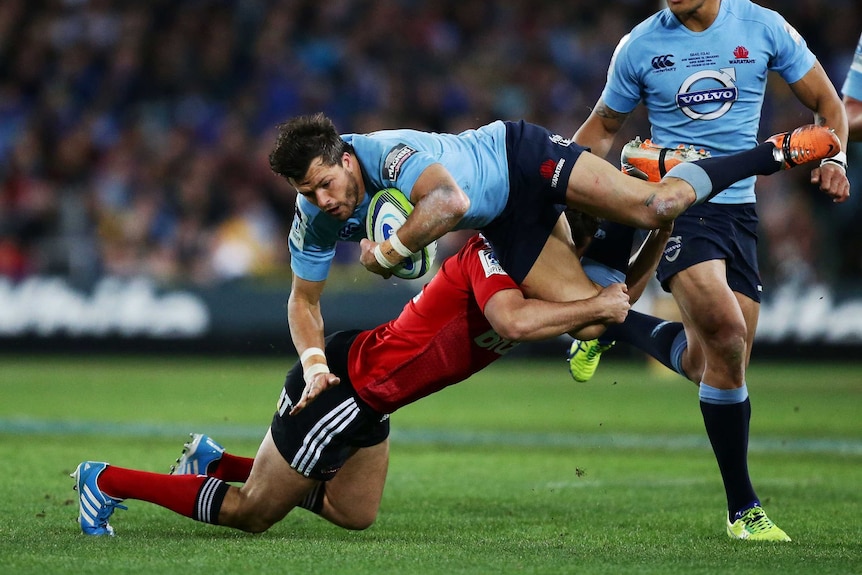 Crucial role ... Adam Ashley-Cooper meets the Crusaders defence