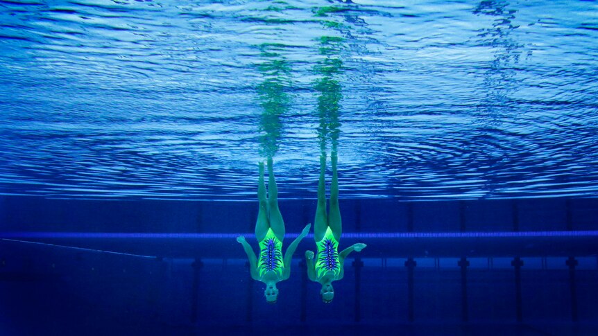 Italy's Giulia Lapi and Mariangela Perrupato perform in the synchronised swimming duets.