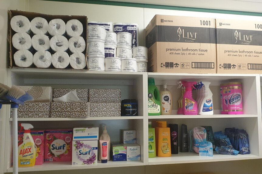 Shelves stacked with toiletry items.