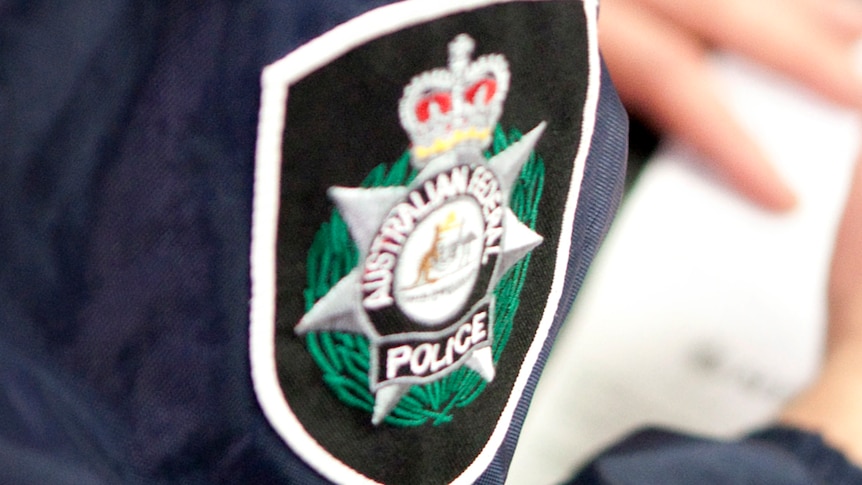 An officer from the Australian Federal Police force pictured at work on April 24, 2013.