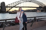 Two children in front of Sydney Harbour Bridge.