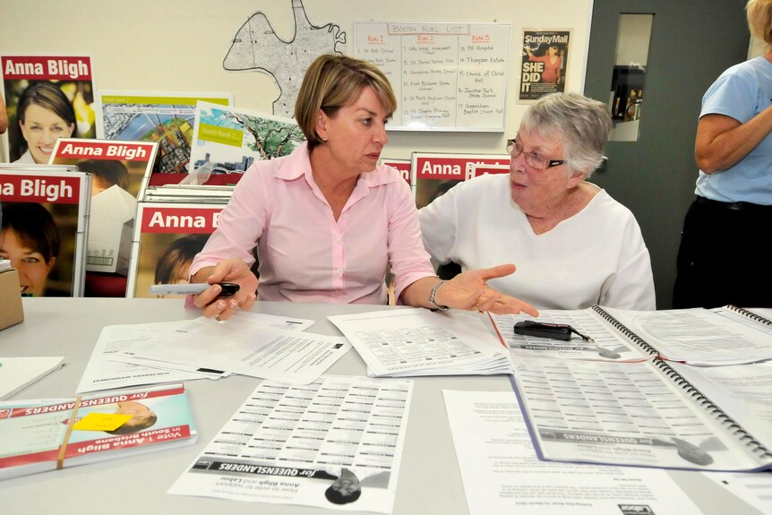 Queensland Premier Anna Bligh chats with her mother Fran Tancred at her electoral office in West End.
