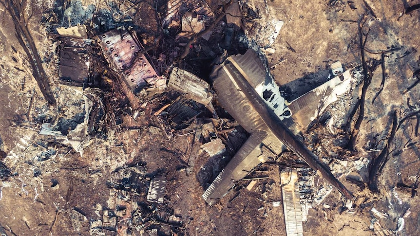 aerial view of a destroyed and burnt out plane