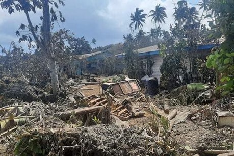 Debris is seen in a street in Nuku'alofa after a volcanic eruption and subsequent tsunami.