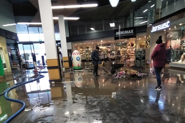 Flood clean-up inside Channel Court, Kingston, May 2018.