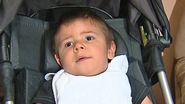 Levi Mippy sitting in his pushchair