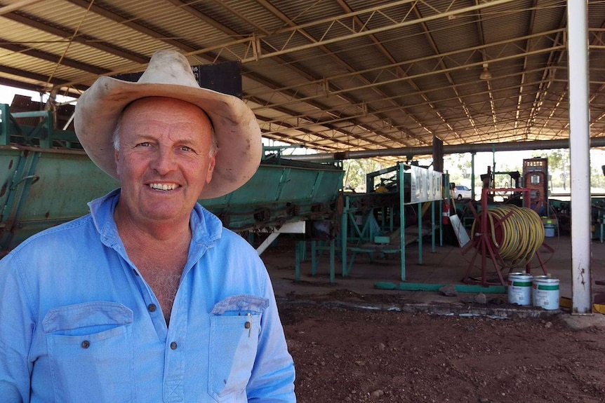 Blackall-Tambo Mayor Andrew Martin stands next to the Tambo sawmill