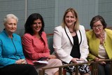 Kerryn Phelps in blue, Julia Banks in pink, Rebekha Sharkie in white and black, and Cathy McGowan in lime green.