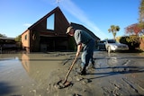 Resident cleans up liquefaction in Christchurch