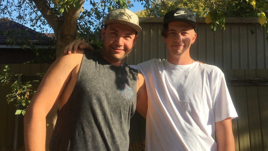 Tye Atkinson and Nathan Harris who are both getting treatment at the cottage, stand together under a tree