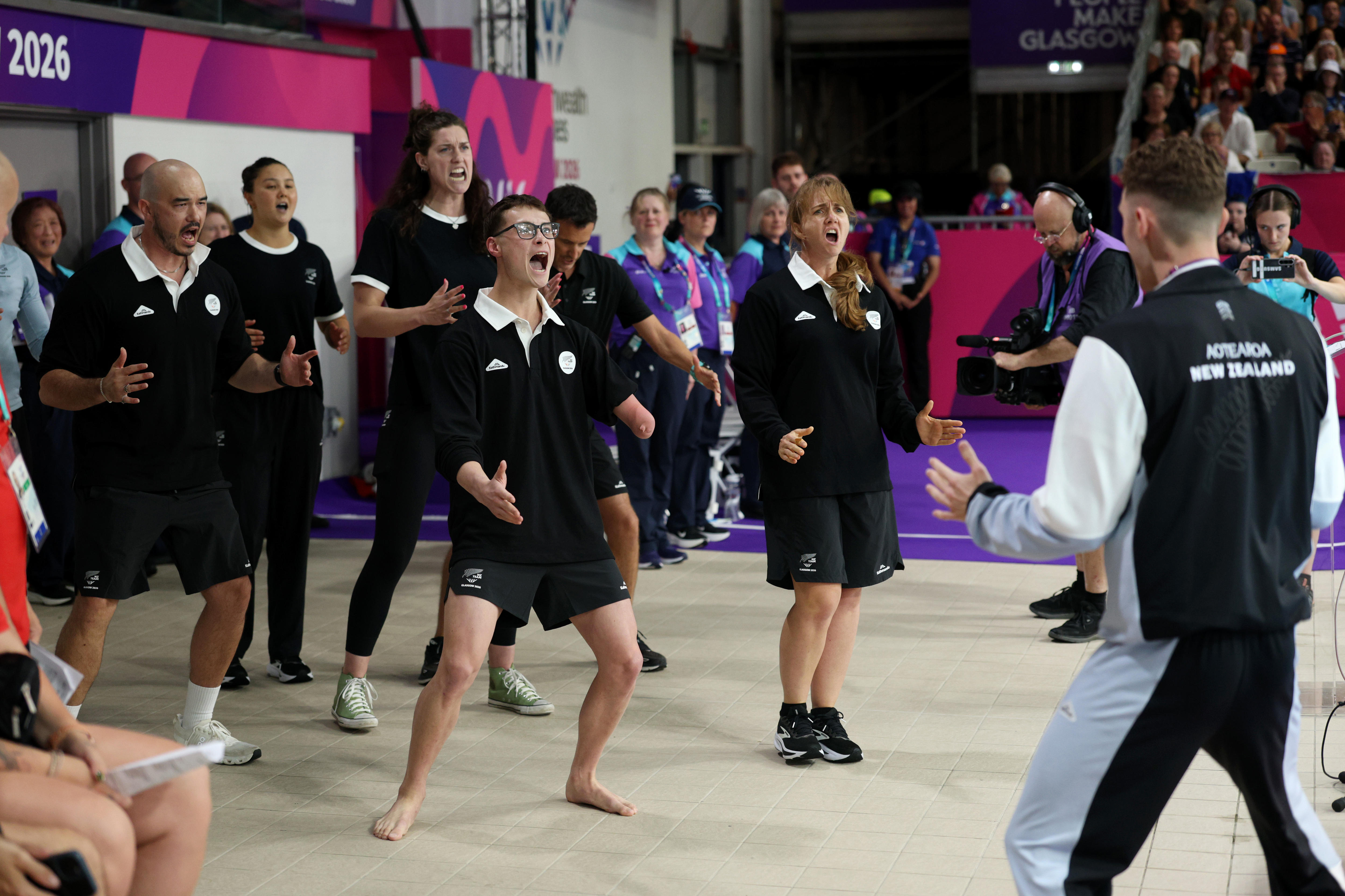 Lewis Clareburt and his New Zealand teammates perform a haka.