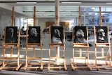 Black and white portraits on display in the Port Macquarie Library.