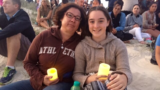 Mother and Daughter Nicole and Maddison attend a candle light vigil on the Gold Coast for domestic violence