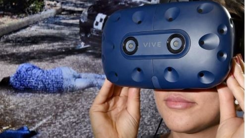 Woman with a virtual reality headset views a simulated hit and run scene