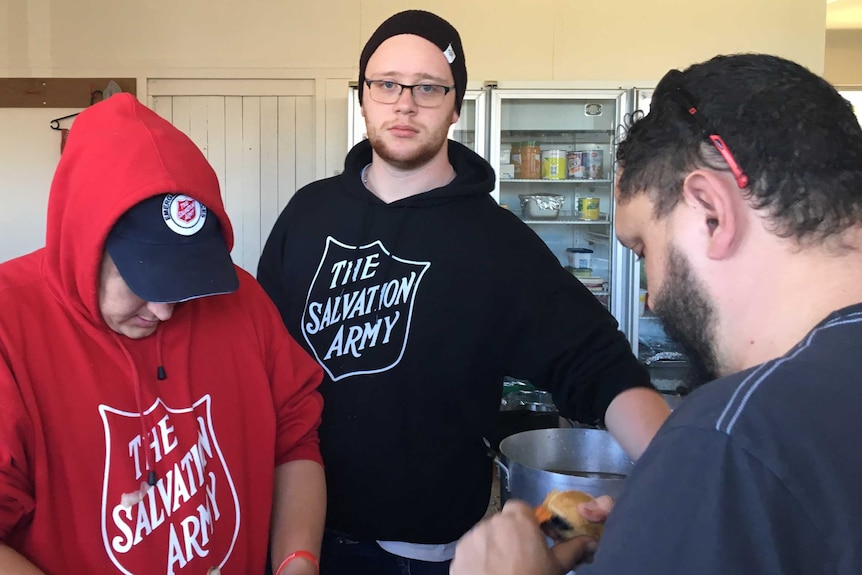 Volunteers including Luke in the Dorrigo Evacuation Centre kitchen