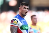 Newcastle Knights centre Bradman Best stands on the field during NRL Magic Round against the Gold Coast Titans.