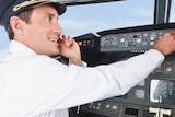 Airline pilot using mobile phone while flying